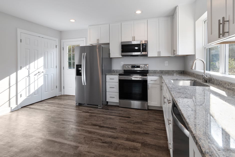 Modern renovated kitchen with custom cabinets and island